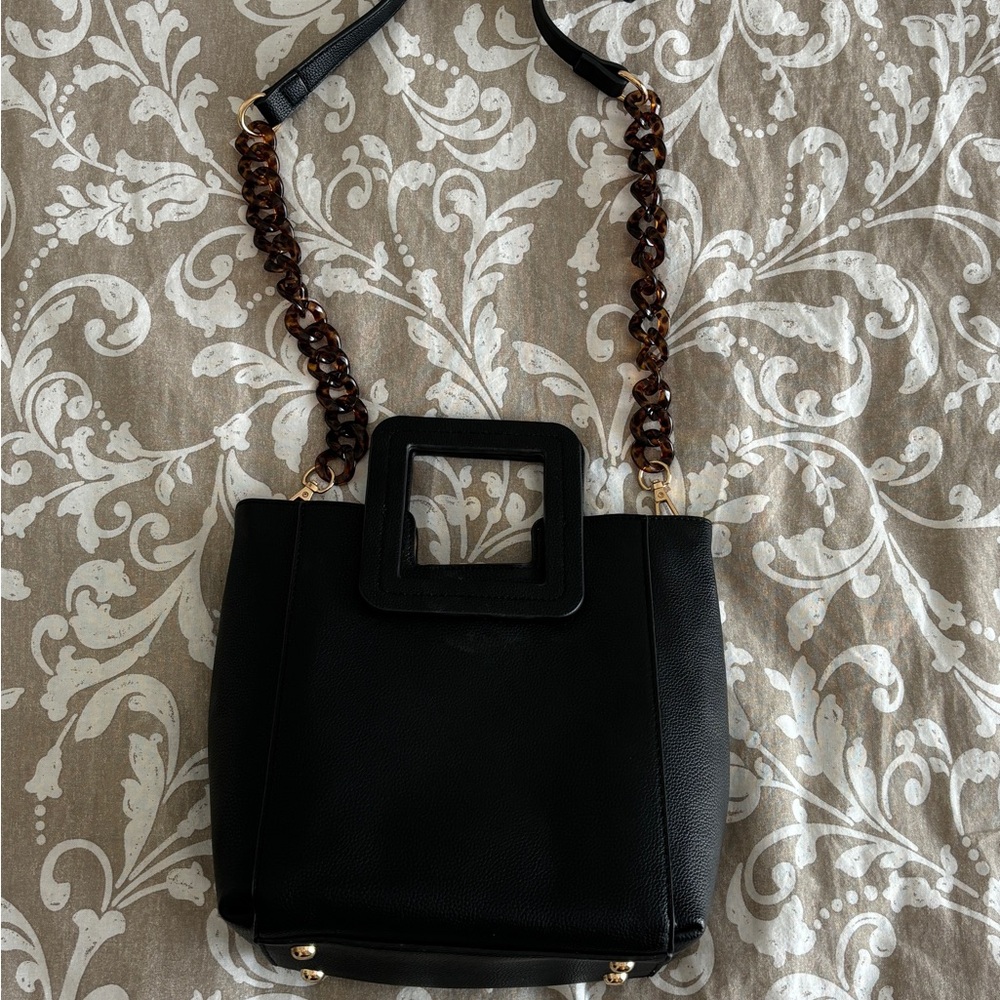 Adorable woman black purse